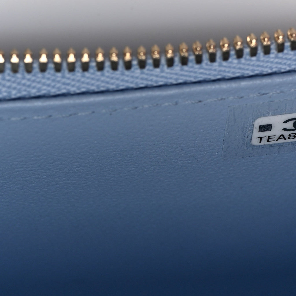 Lambskin Quilted Small Top Handle Vanity Case With Chain Light Blue