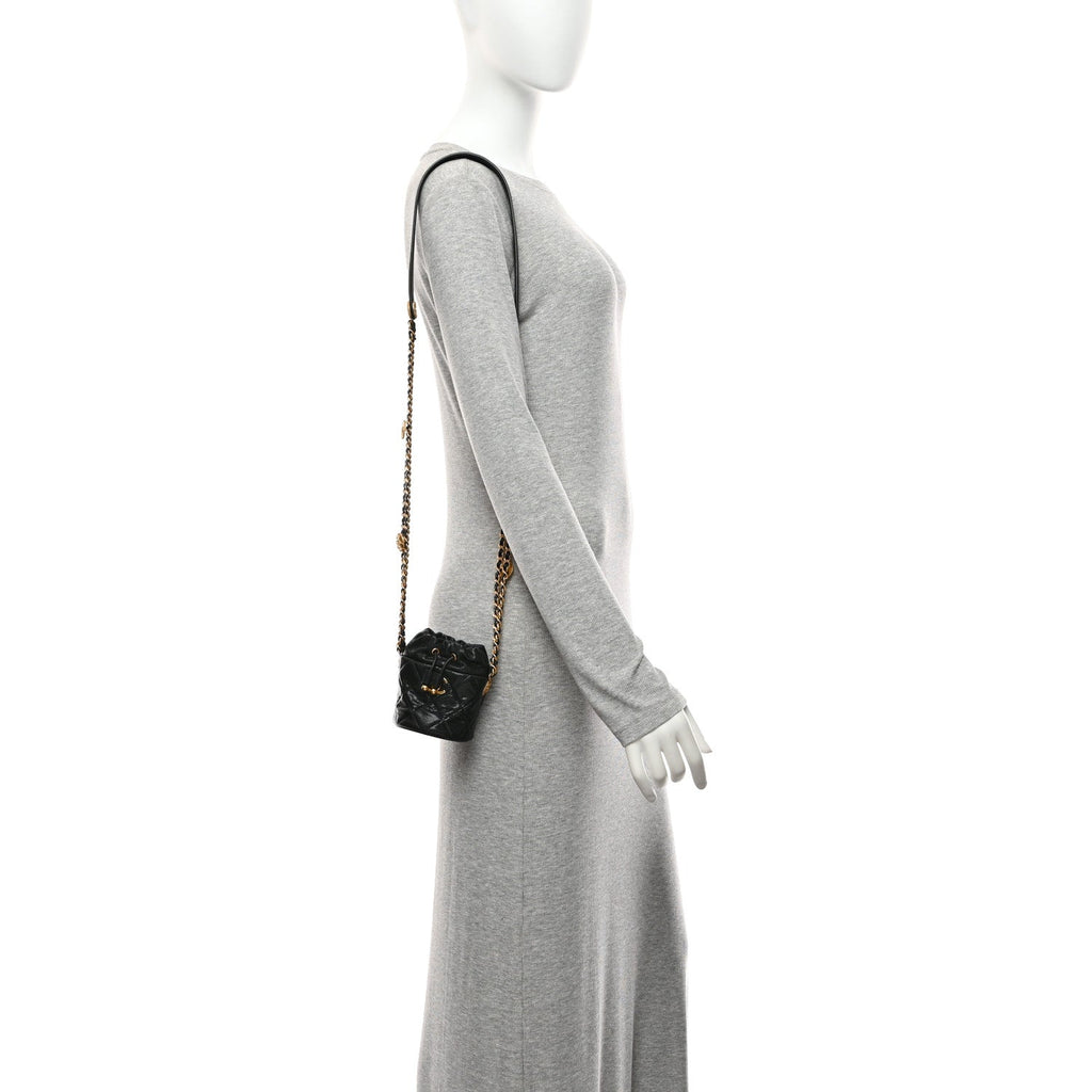 Caviar Quilted Twist Your Buttons Mini Bucket Bag Black