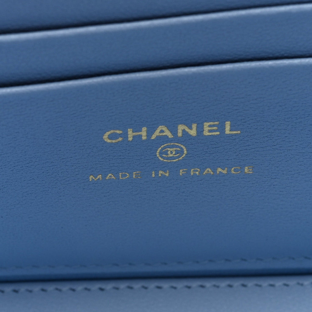 Lambskin Quilted Small Top Handle Vanity Case With Chain Light Blue