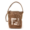 Shearling F is Fendi Macro FF 1974 Diagonal Mini Mon Tresor Bucket Bag Grace Camel