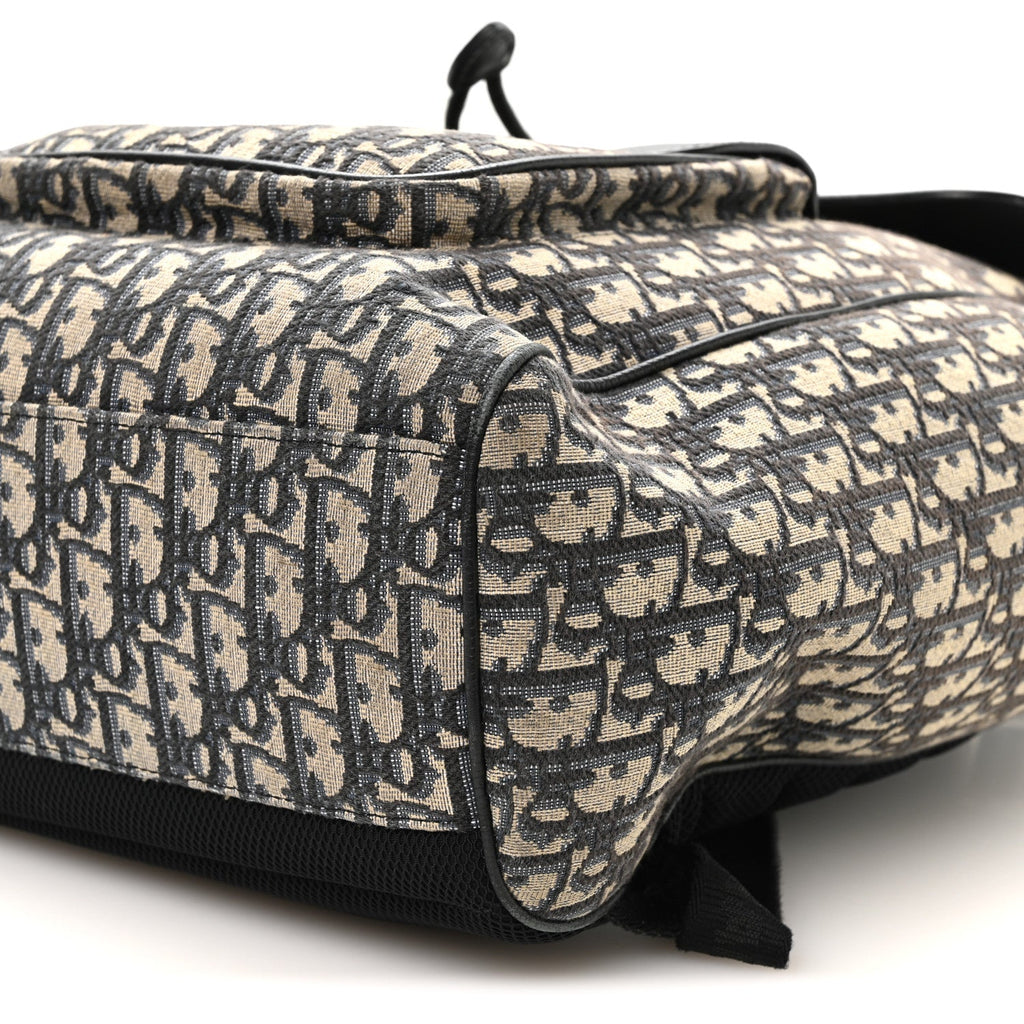 Oblique Jacquard Grained Calfskin Drawstring Saddle Backpack Beige Black